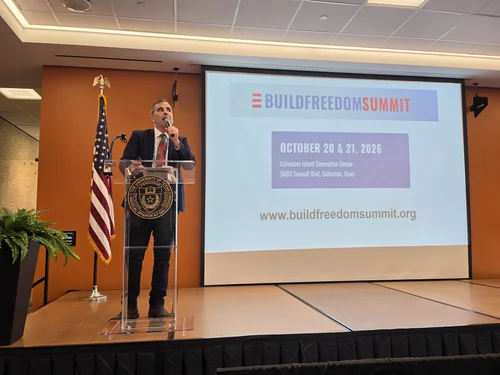 A speaker addressing the Galveston Construction B2B Expo